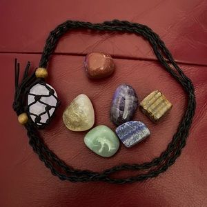 Polished chakra stones with macramé cage